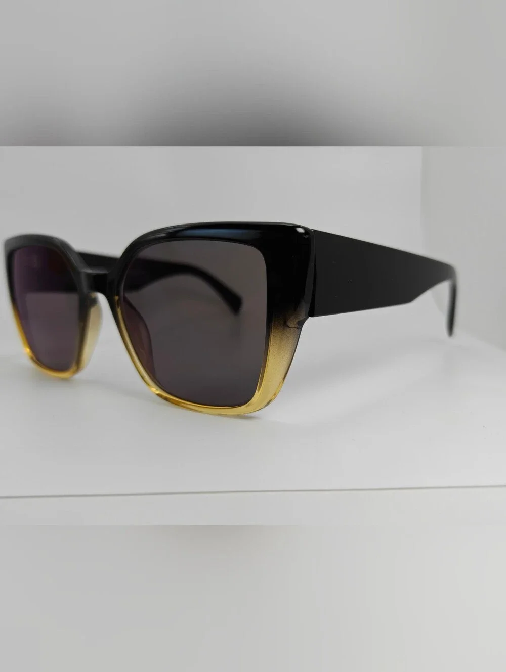 Pierrette. Women's Black to Gold Gradient Cat-Eye Sunglasses.